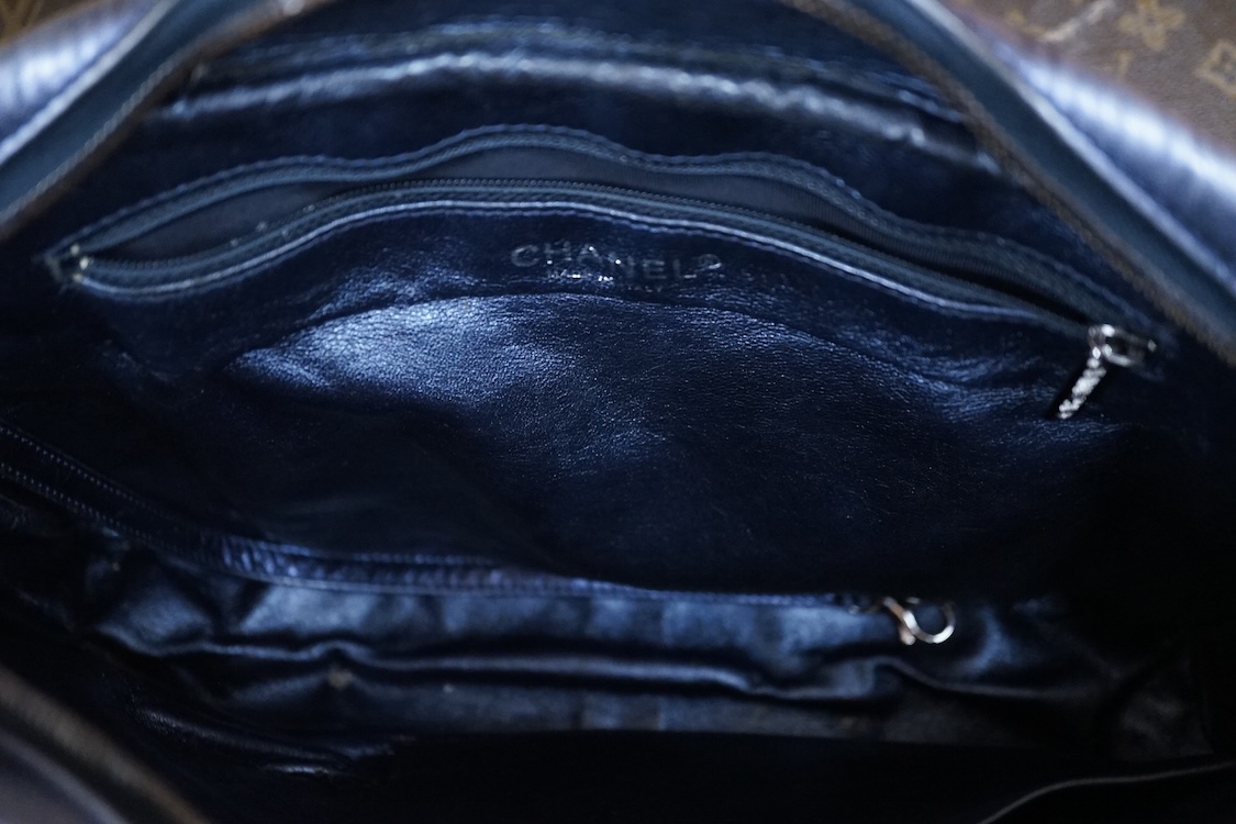 A Chanel metallic 2.55 re-issue quilted camera bag, date code 12407681, 35cm wide